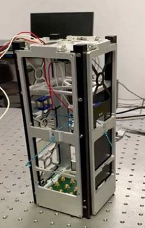 A stack of three cubes of Cubesat