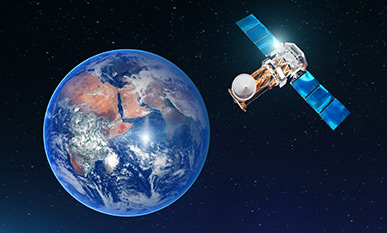 Satellite orbiting Earth in outer space with solar panels and global view