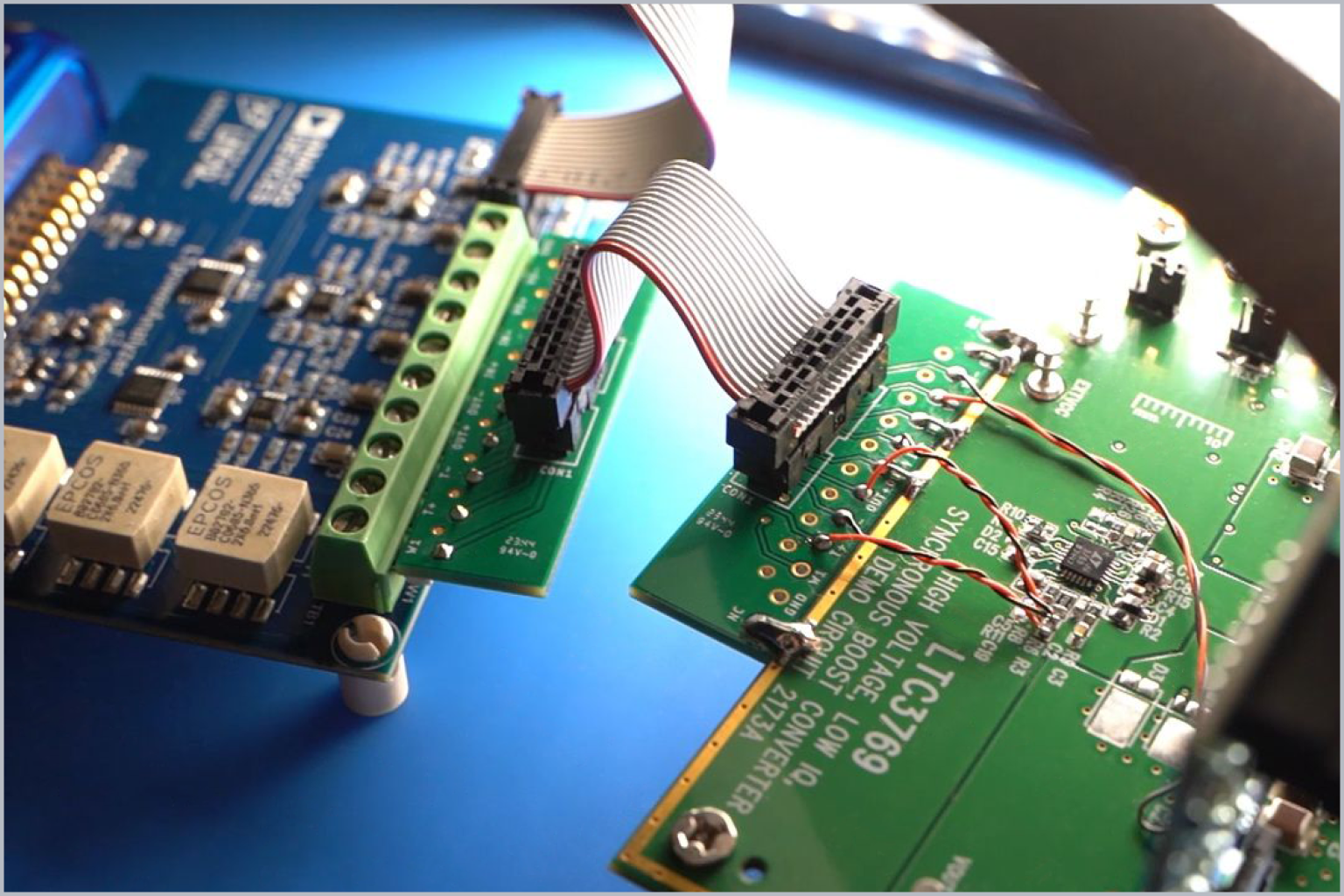 Collage showcasing a power management tool: a waveform analysis interface, ADALM2000 Active Learning Module with circuit boards, and connected hardware setup for testing.