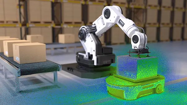 Robotic arm placing a box onto an autonomous mobile robot in a warehouse.