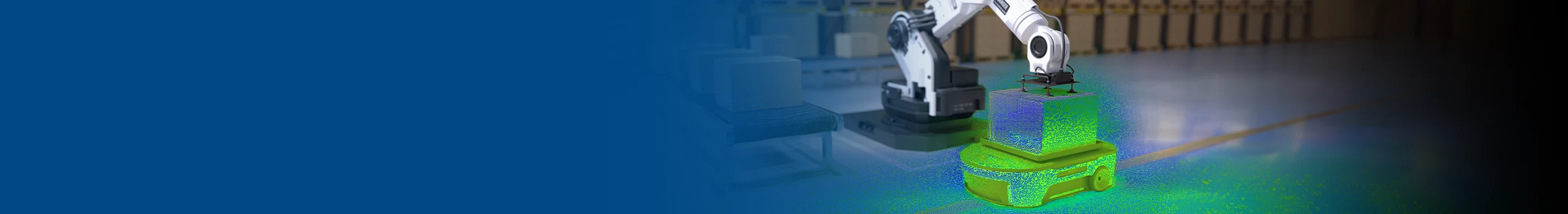 Robotic arm placing a box onto an autonomous mobile robot in a warehouse.