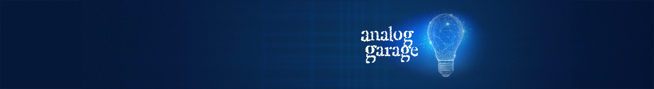 Digital lightbulb graphic next to the text 'analog garage' on a dark blue background