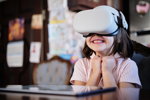 a young girl excidely laughing while wearing a vr headset