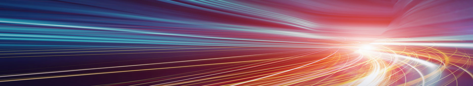 Abstract motion blur effect with red, blue, and yellow light trails creating a dynamic and futuristic visual flow.