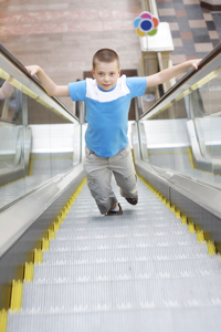 Figure 1. The boy running up this escalator is using an unconventional way to reach his goal, probably the toy section. We engineers can take note and try to solve problems with unconventional methods.