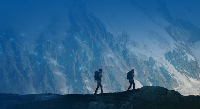 Two people hiking in the mountains with network mesh superimposed