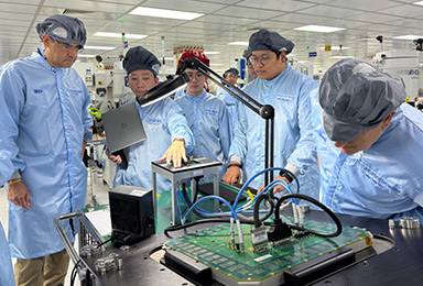 The ADI high-reliability engineering development team reviews the high-/low-temperature test set
