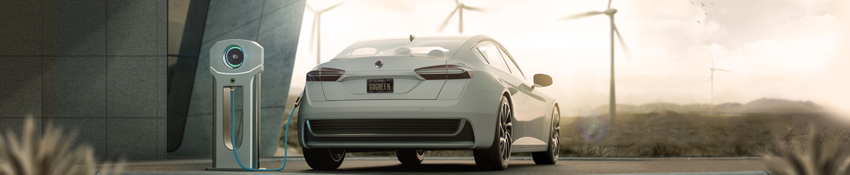 Image shows an electric car being charged next to a home. In the far distance are several wind turbines.