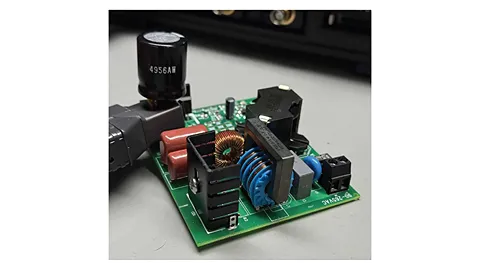 Short extension added to the capacitor leads to allow ripple‑current measurement with a current probe.