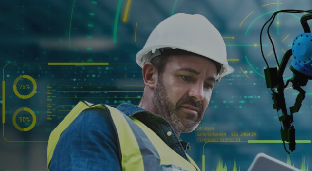 man in hard hat in a robotic lab
