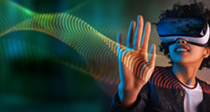 Graphic image shows a woman with a Virtuality Reality Headset over her eyes. She is reviewing an image of a picturesque landscape, shown on the lens.