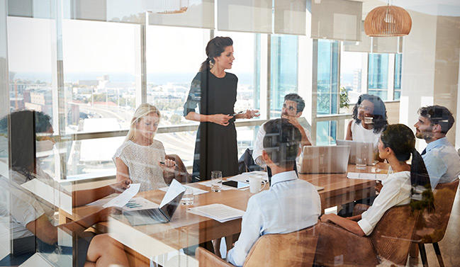 Female employee leading a meeting