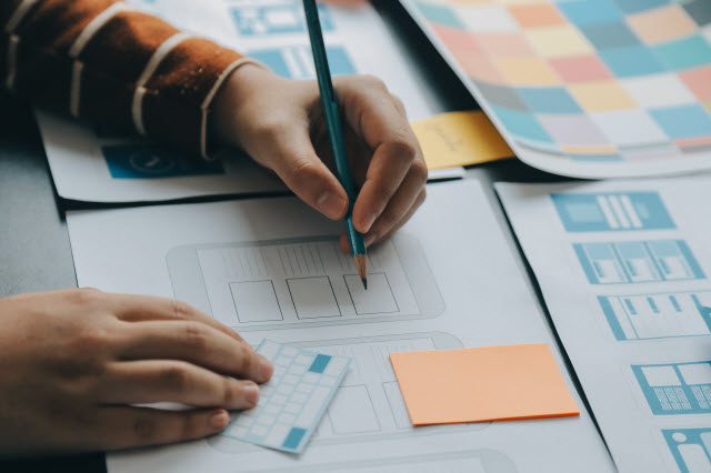 left handed person filling out form