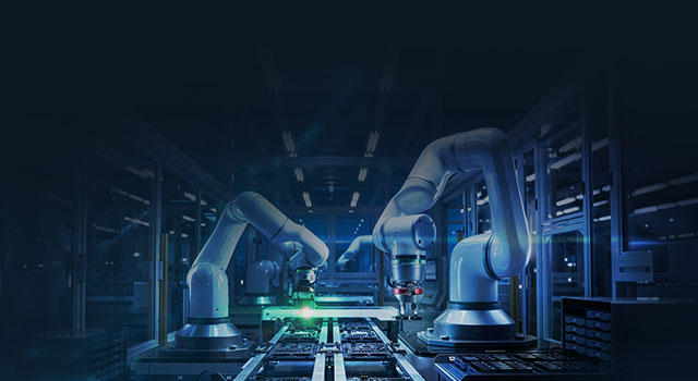 Robotic arms assembling circuit boards in a dark factory.