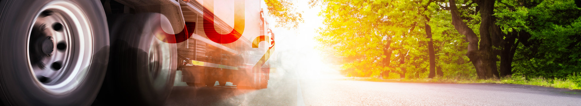 A semi-trailer truck riding through a bright future on a highway