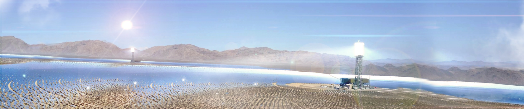 Desert landscape with hundreds of motion controlled solar-tracking heliostat panels and Brightsource technologies.
