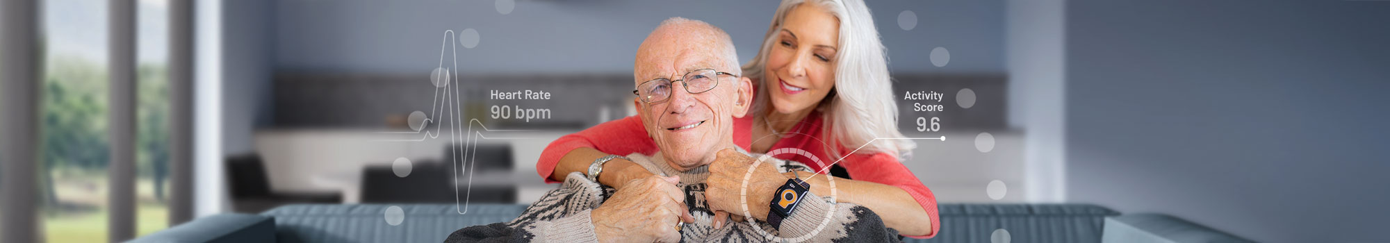 Elderly man wears the Tempo watch while being hugged by his daughter.