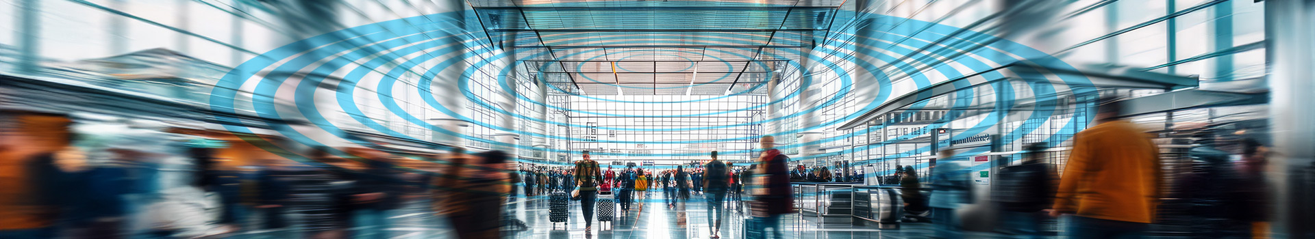 Busy airport terminal with passengers walking through, overlaid with digital concentric rings symbolizing wireless communication or connectivity.