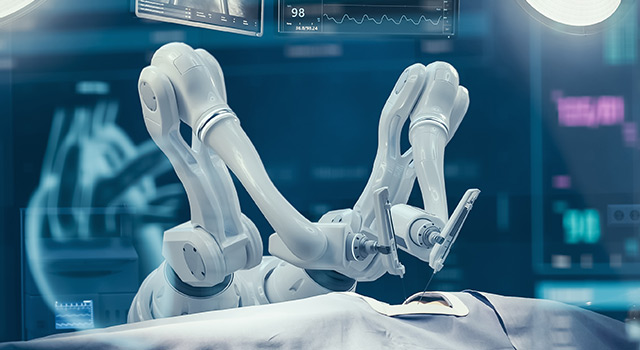Surgical robot operating on a patient.