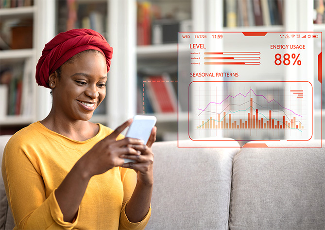 A woman is looking at her phone to monitor her homes energy usage.