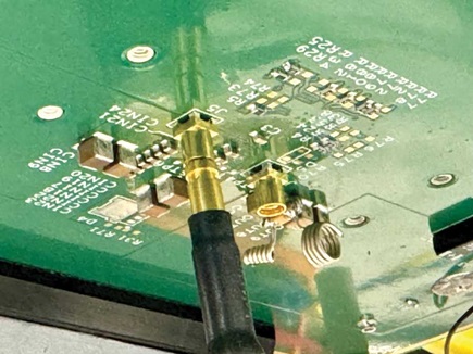 Figure 4. Tektronix TIVP100 optical probe connected to the top gate via an MMCX connector.