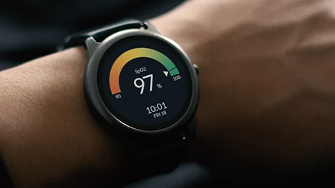 Smartwatch on wrist displaying 97% blood oxygen level.
