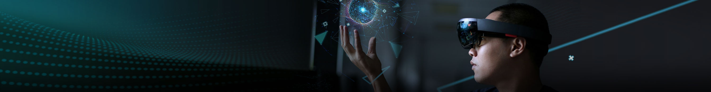Man with hololens glasses holds a virtual reality ball
