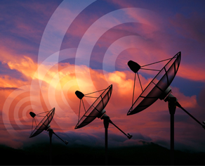Small satellite dish Antennas send signals into the sky.