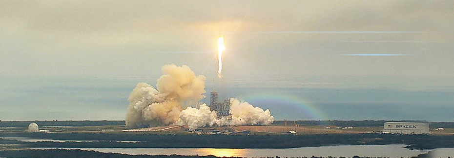 SpaceX's Falcon 9 rocket launches from the Earth's surface.